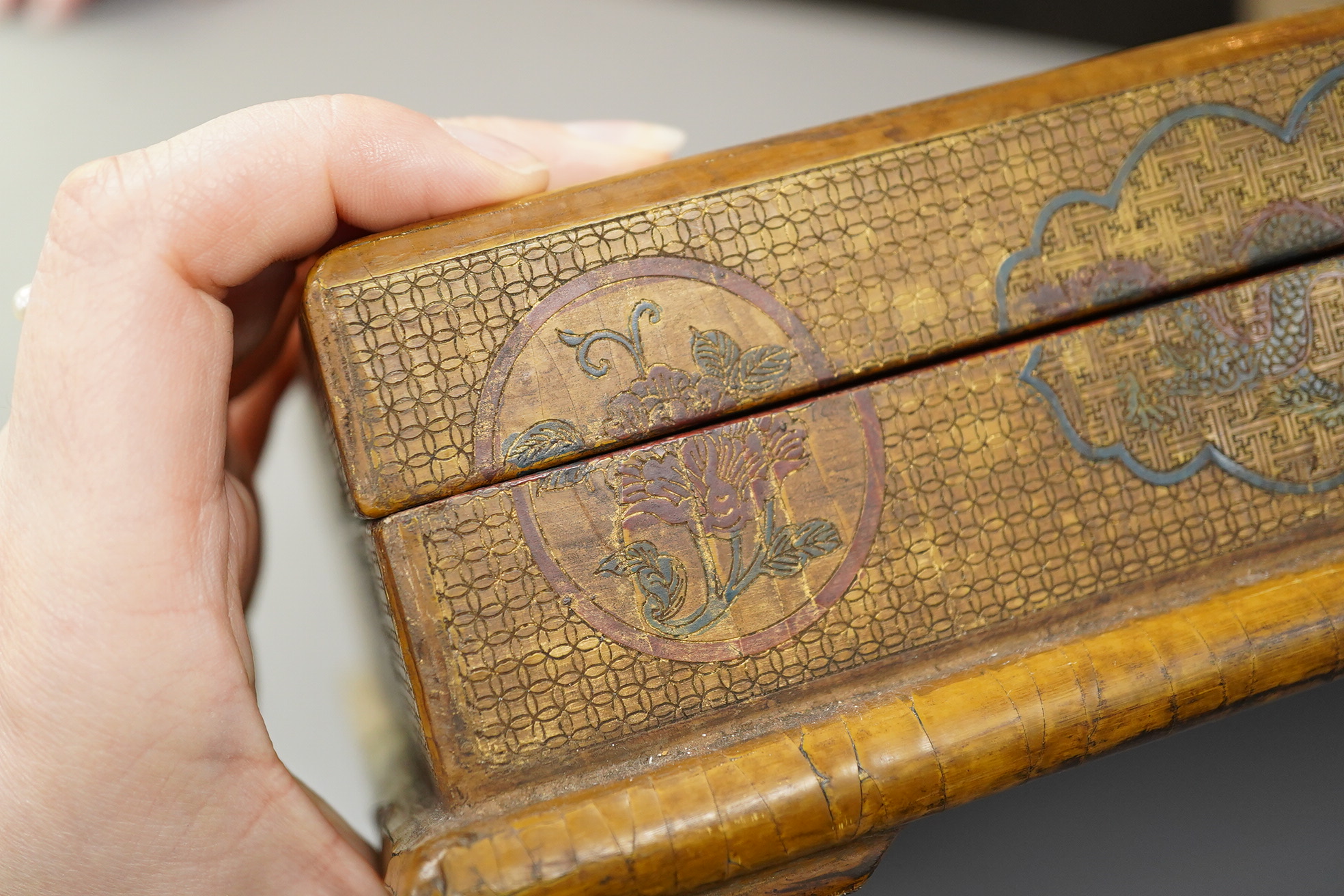 A Chinese inscribed polychrome lacquer document box, Qianlong mark and inscription